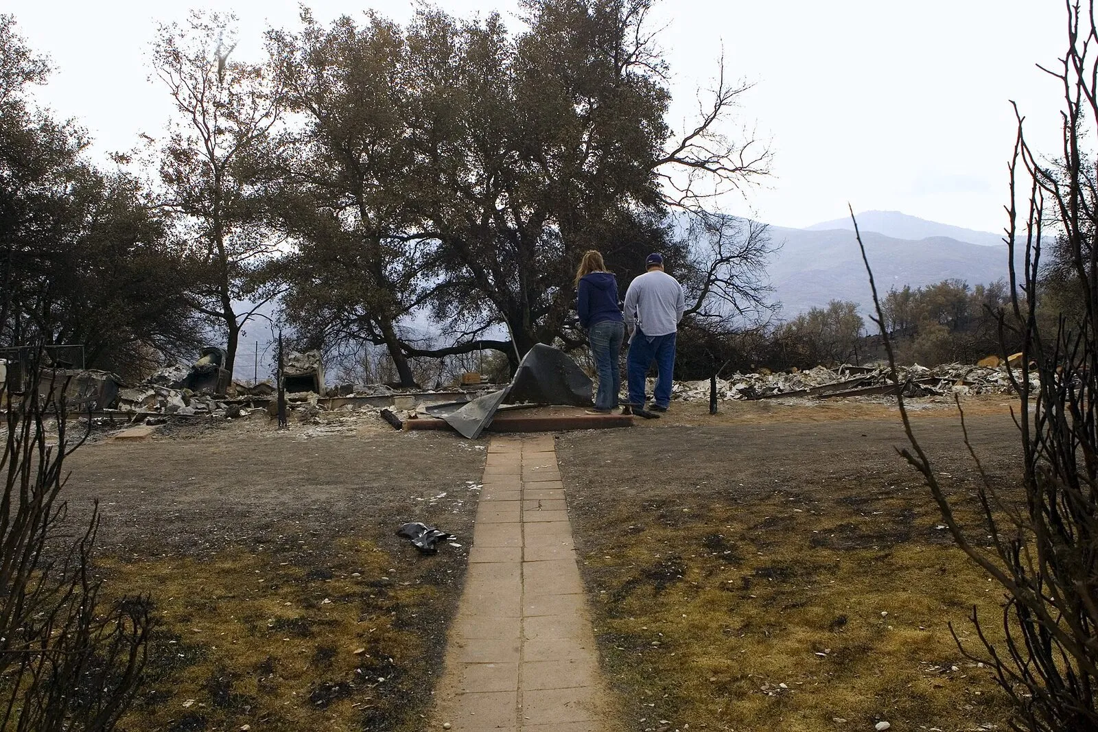 Wildfire damage across a Southern California neighborhood